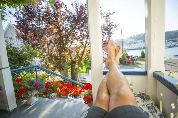 istock relaxing man with bare feet in the nature 1168461331