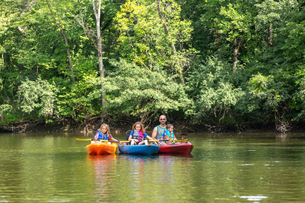 istock Family Kayaking on River In Summer 1168462705