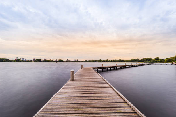 istock Wooden footpath over the water 1168464929