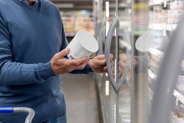 Unrecognizable man decides he doesn't want the yogurt