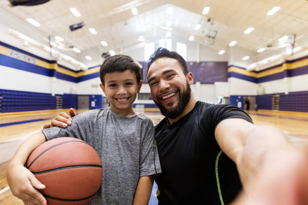 istock Uncle and nephew take selfie to remember day together 1168467467