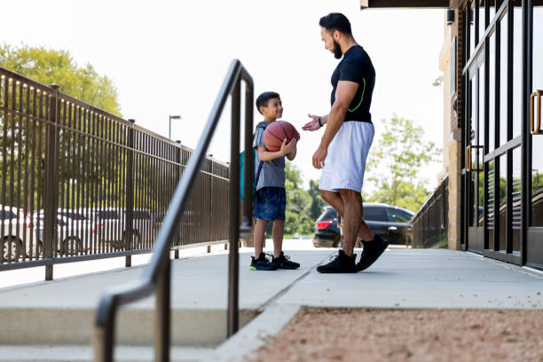 istock Before entering gym, dad gives young son rules 1168467509