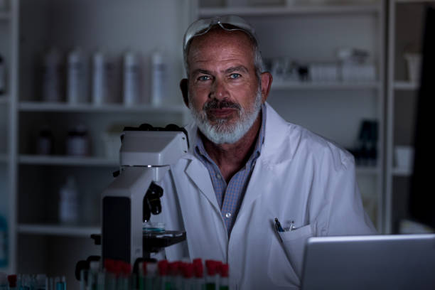 istock Confident male scientist at work in his lab 1168467579