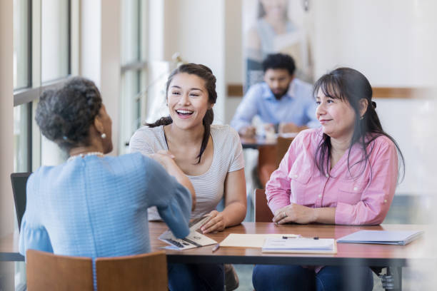 istock College student meets with loan officer 1168467795