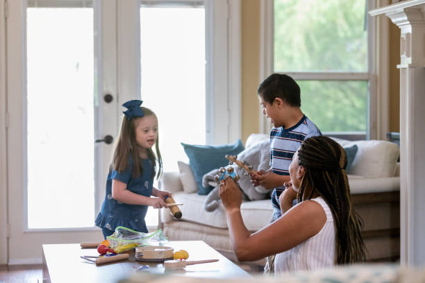 istock Play therapist works with special needs children 1168468386