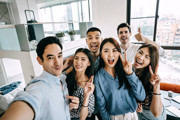 istock Group of multi-ethnic friends taking Selfie 1168469142