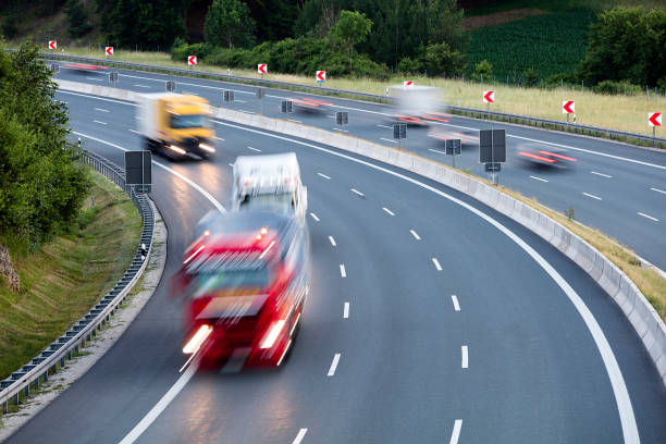 istock Heavy Goods Transportation in Germany, Semi Trucks Speeding 1168469292