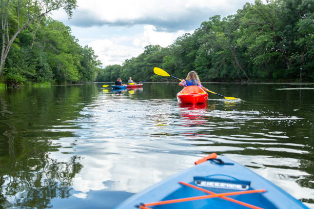 istock Family Kayaking on River on Summer Day 1168470010