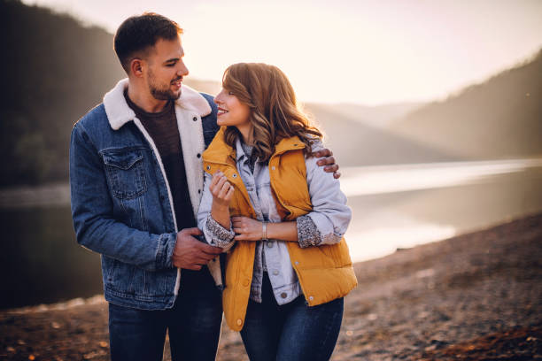 istock Passionate Young Couple Spending Time By Lake 1168474160