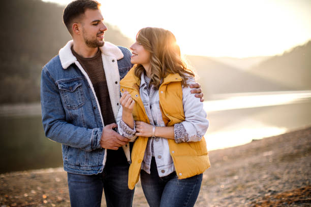istock Passionate Young Couple Spending Time By Lake 1168474243