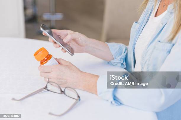 Using A Digital Tablet Stock Photo - Download Image Now - Chronic Illness, Taking Medicine, Using Phone