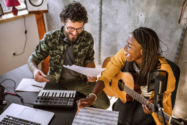 istock Having a lot of fun while composing new song 1168477298
