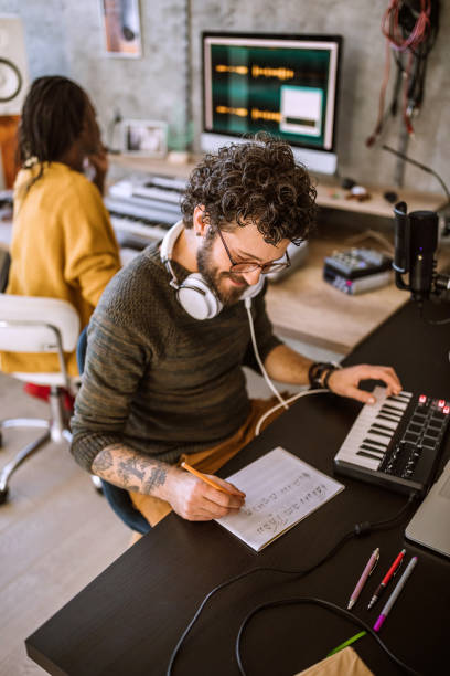 istock Multi-ethnic Team of composers working in studio 1168477386