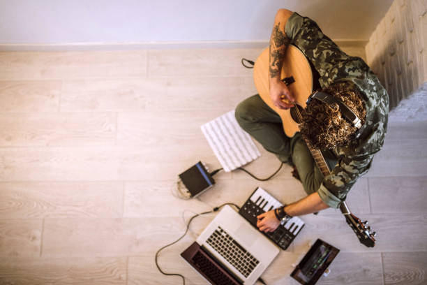 istock Directly above of guitars on floor 1168477392