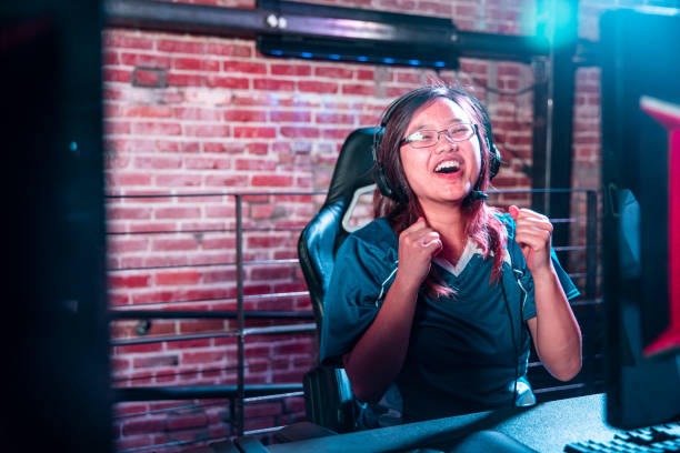 istock Gamer celebrating while playing esports 1168477648