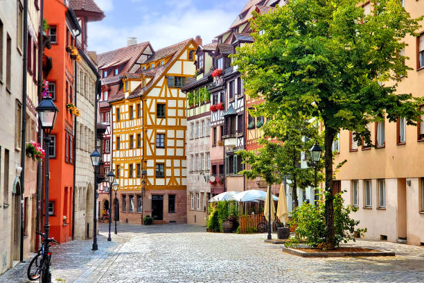 Half timbered buildings in the picturesque Old Town of Nuremberg, Germany Beautiful street of half timbered buildings in the picturesque Old Town of Nuremberg, Bavaria, Germany franconia photos stock pictures, royalty-free photos & images