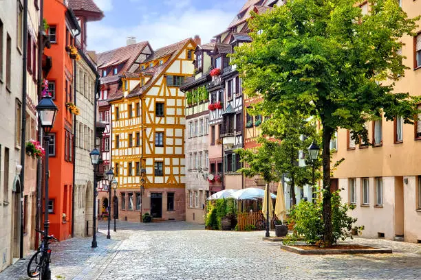 Beautiful street of half timbered buildings in the picturesque Old Town of Nuremberg, Bavaria, Germany