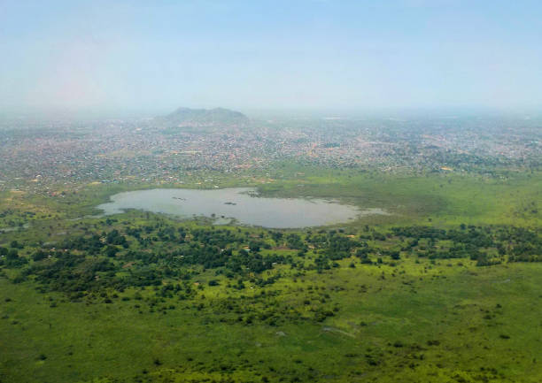 Juba, South Sudan - from the air Juba, South Sudan: Africa's newest capital seen from the air - lake and mountain - White Nile in the background south sudan stock pictures, royalty-free photos & images