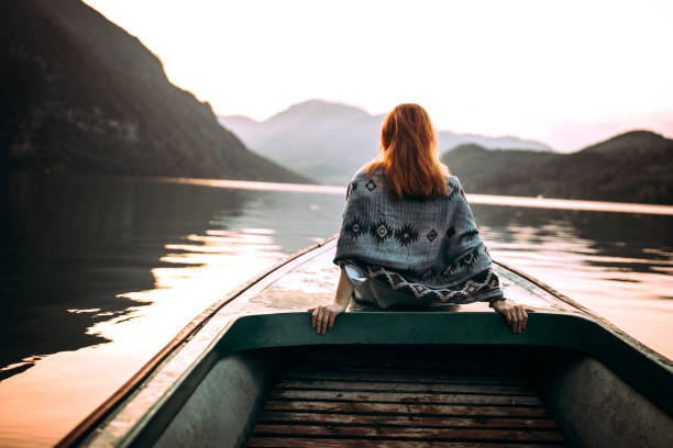 istock Enjoying in view on small boat on lake 1168484611