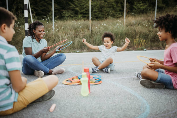 istock Stick and hoop game on sunny day 1168485384