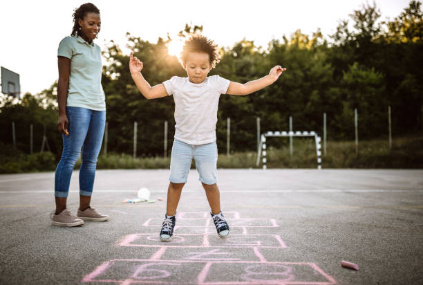 istock Hopscotch fun for whole family 1168485401