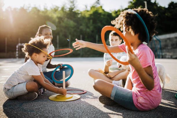 istock Stick and hoop game on sunny day 1168485420