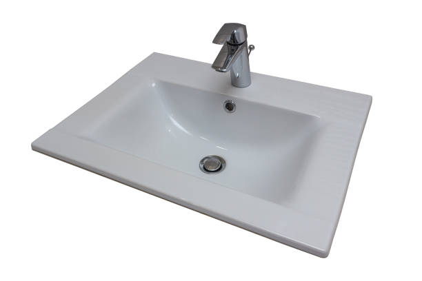 istock Ceramic white washbasin with stainless faucet 1168489402