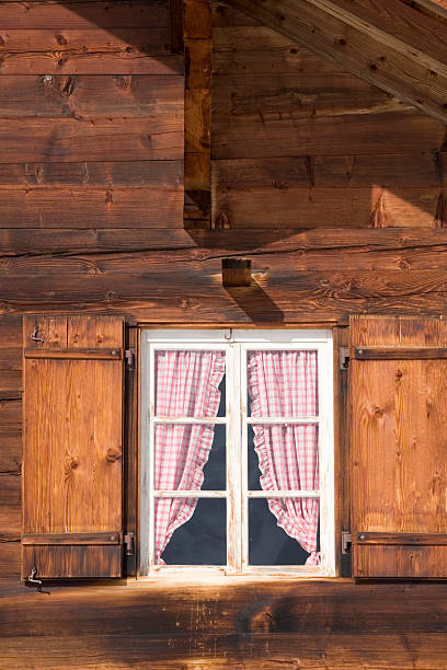 istock window with curtains of a mountain chalet 116849416