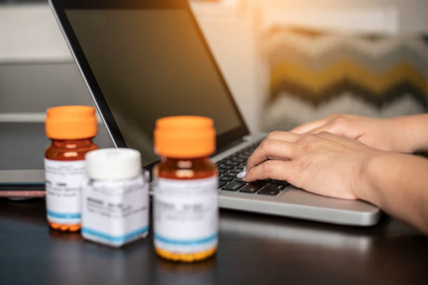istock Family Looking Up Medication 1168495060