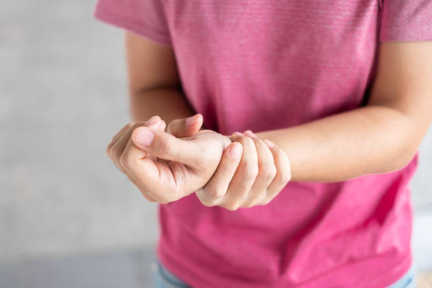 istock Young woman holding her wrist pain because using computer long time. De Quervain's tenosynovitis, Intersection Symptom, Carpal Tunnel Syndrome or Office syndrome.Disease and healthcare concept 1168495061