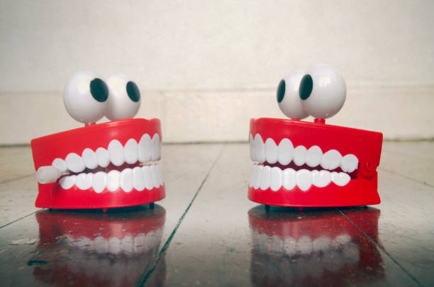 Eyes and teeth toy on white background