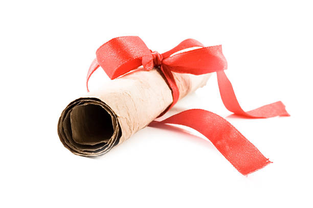 istock Diploma with red ribbon on white background 116851146