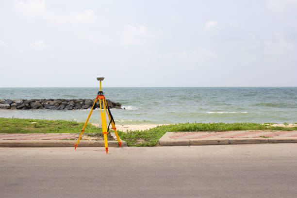 gps surveying in field sea background, global positioning system. - azimuth imagens e fotografias de stock
