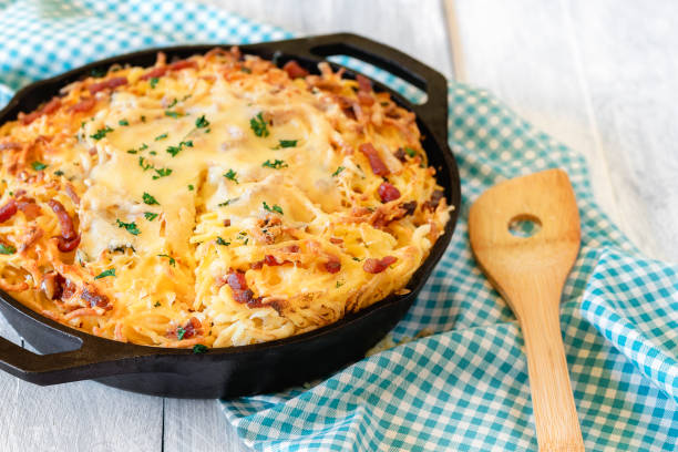 istock Iron pan with spaetzle. Cheese pasta, German recipe 1168519486