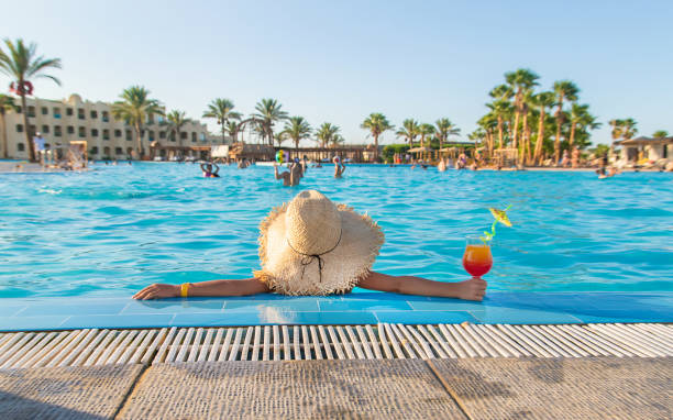 A child at the sea drinks a cocktail. Selective focus. A child at the sea drinks a cocktail. Selective focus. nature. tunisia beach stock pictures, royalty-free photos & images