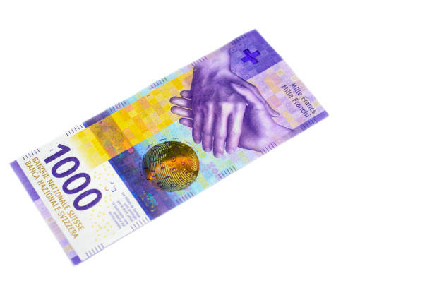 スイスの通貨とのビジネスコンセプト、コピースペースと白い背景に隔離されたお金 - swiss currency ストックフォトと画像