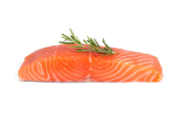 surowy kawałek łososia z rozmarynem wyizolowanym na białym tle - fillet salmon raw freshness zdjęcia i obrazy z banku zdjęć