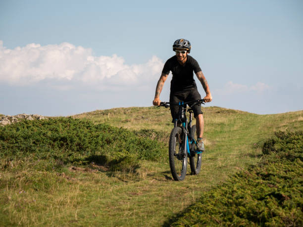 istock Mountain biker riding in the mountains. 1168532037