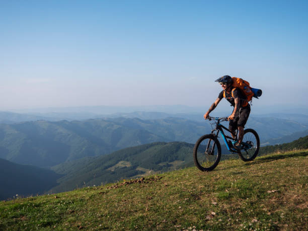istock Mountain biker riding in the mountains. 1168532069