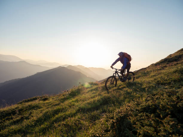 istock Live adventure, mountain biker riding downhill 1168532075