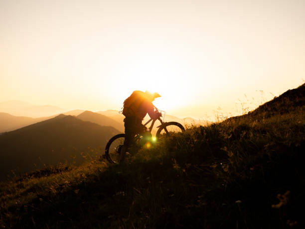 istock A mountain biker riding in the mountains. 1168532114