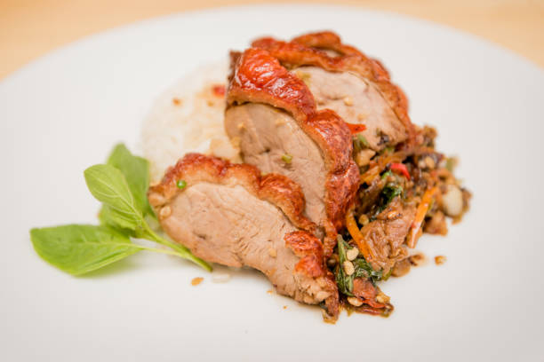 istock stir-fried roasted duck and basil and fried egg with rice, Thai food 1168537710