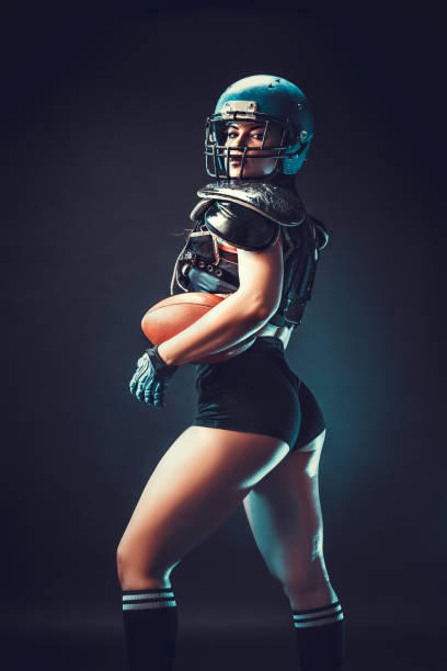 istock Competitive woman with rugby ball 1168539055