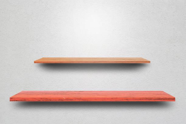 istock Front view empty wooden shelf and grey wall. Design concept 1168541705