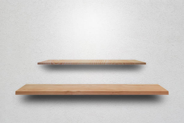 istock Front view empty wooden shelf and grey wall. Design concept 1168541711