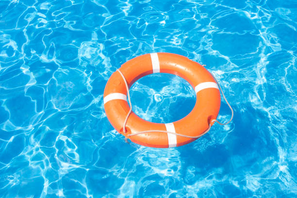 istock Summer Still Life with an orange lifebuoy 1168542498