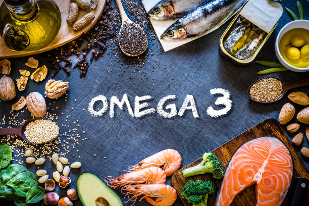 asortyment żywności bogatej w omega-3 z kopią przestrzeni - omega zdjęcia i obrazy z banku zdjęć