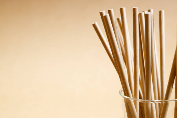 Brown paper straws in glass