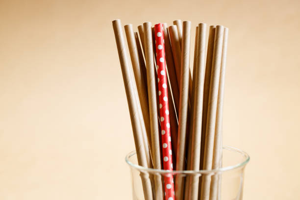 istock Brown paper straws in glass 1168544846