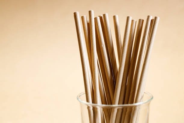 istock Brown paper straws in glass 1168544848